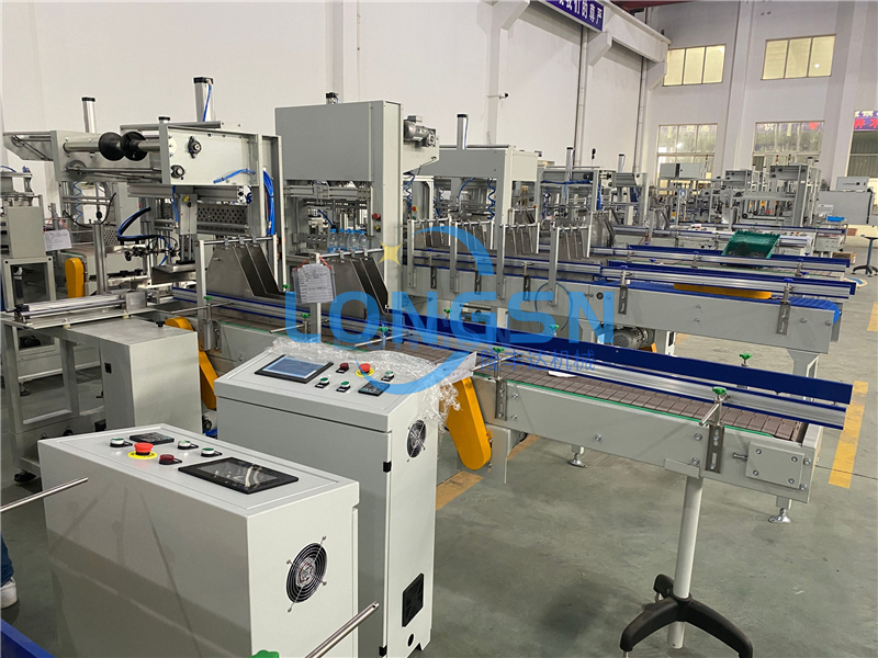 Machine d'emballage de r&eacute;tr&eacute;cissement de bouteille