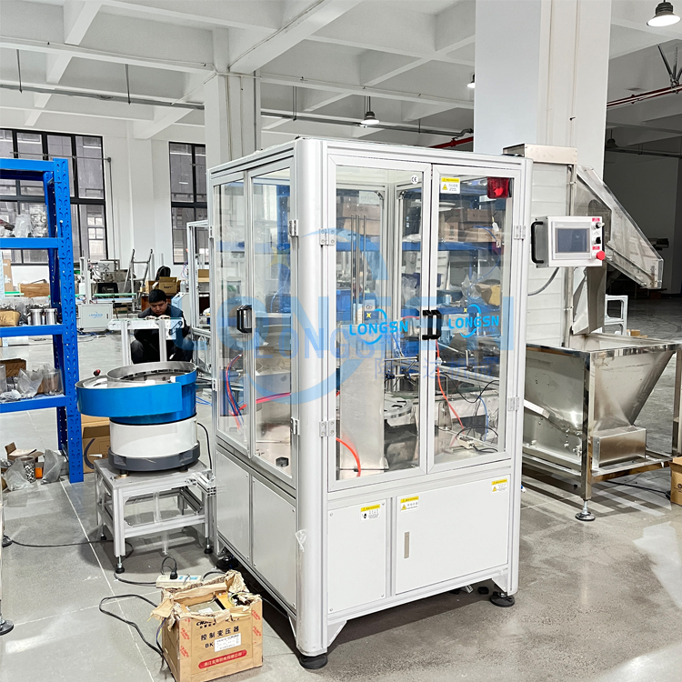 Machine d'insertion de la doublure de joints de capuchon