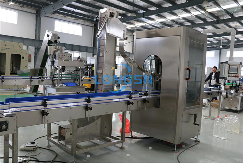 Machine de coiffage &agrave; bouteille